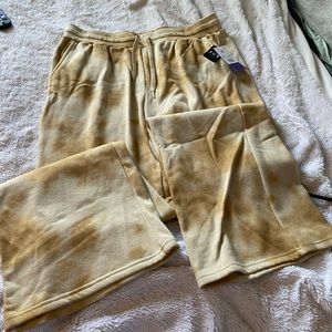 yellow tie dyed flared women’s size large sweatpants never worn new with tags